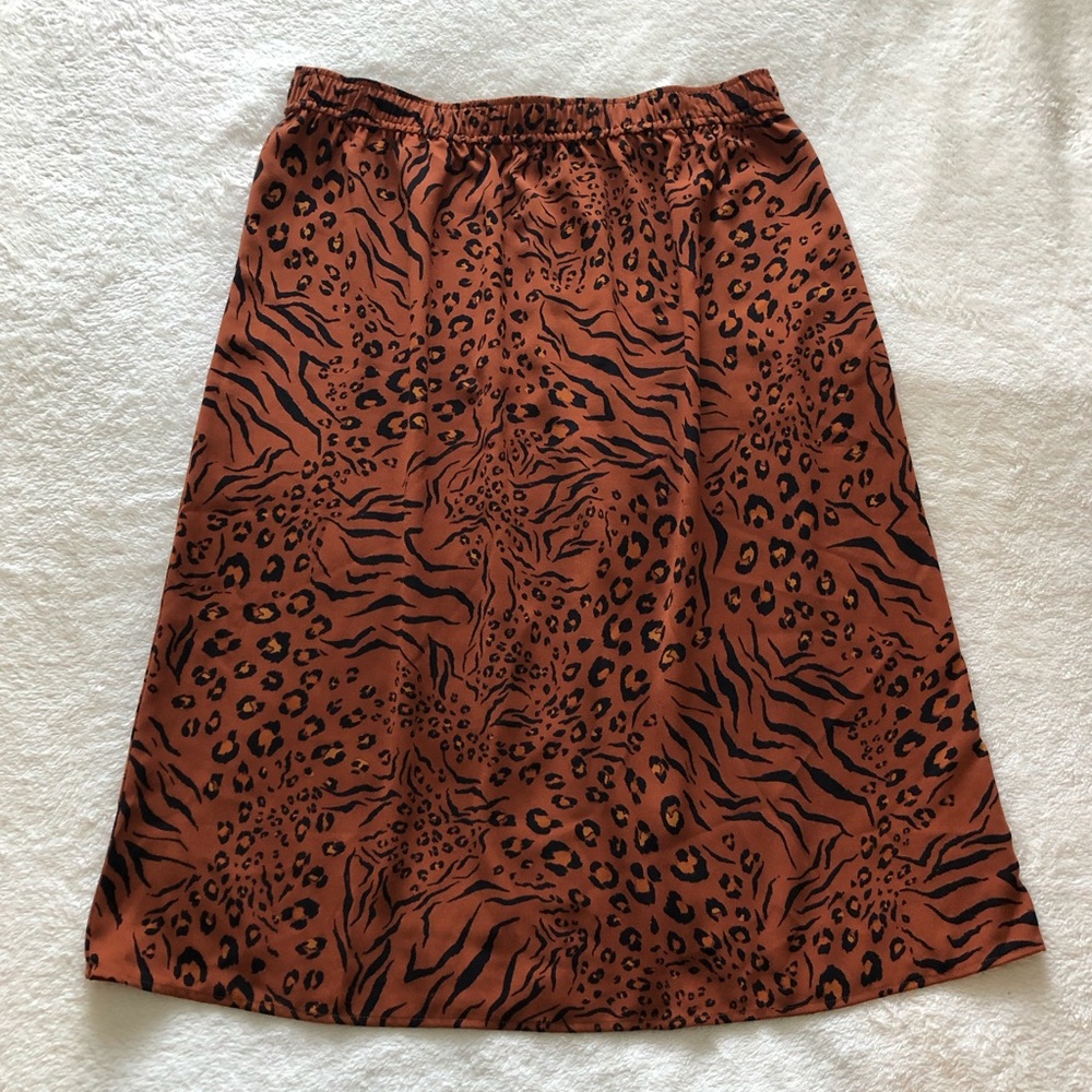 12 Thompson Animal Print Midi Skirt